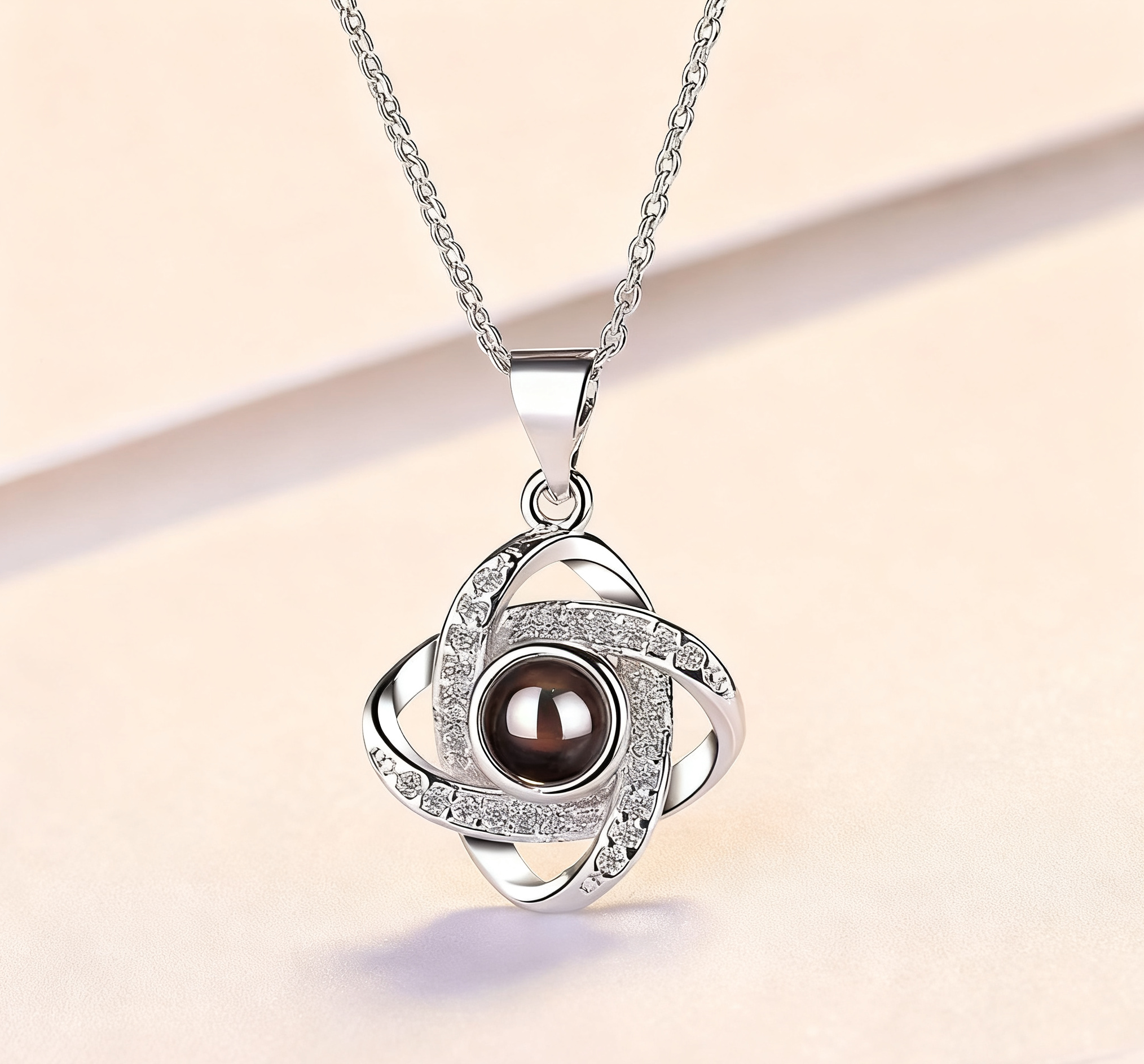 Lucky Light: Four-Leaf Clover Projection Necklace